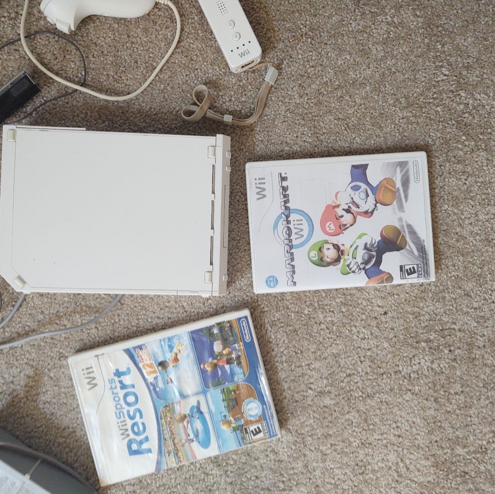 Wii console and 8 games